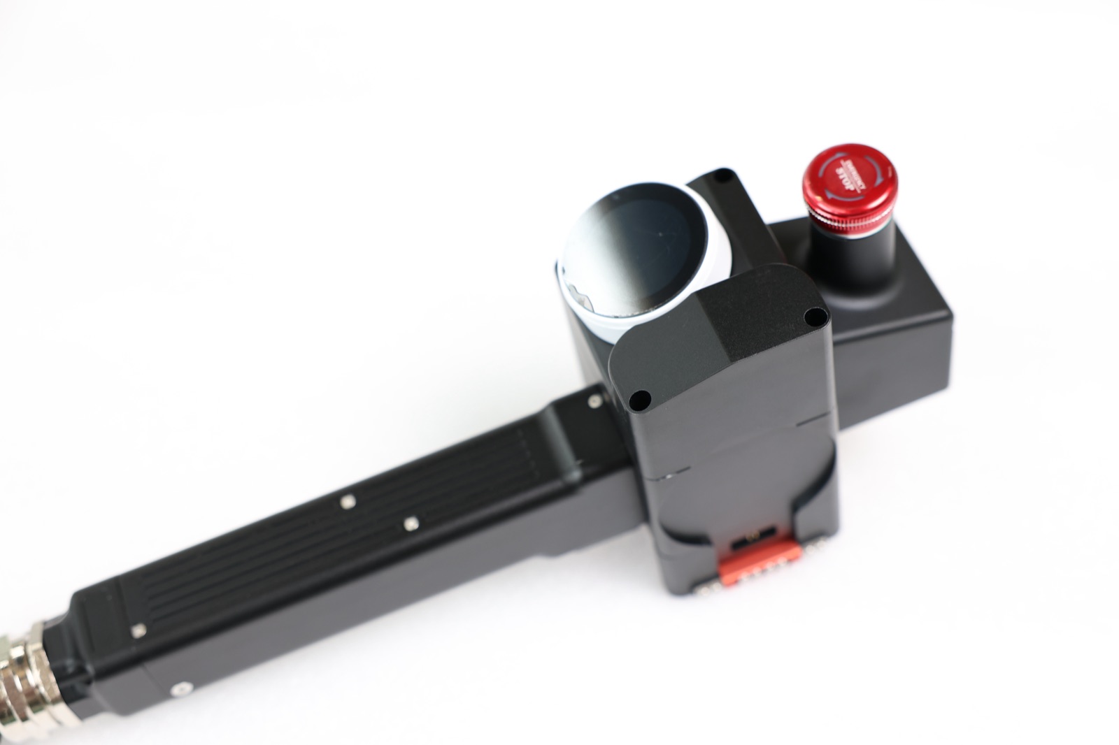 The business end — dial in output power, frequency, and scan pattern right on the 1.1 kg QCS head, mid-job