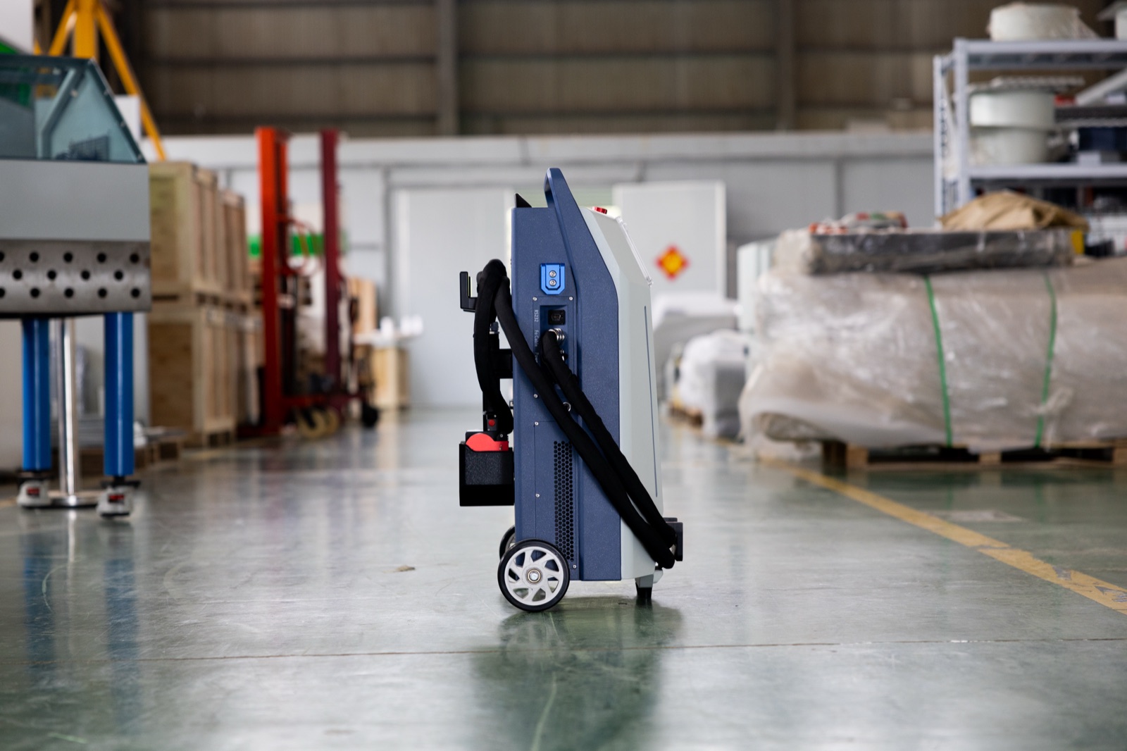 Slim rolling profile — fits through a standard doorway and rides in a van or pickup bed